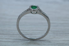 Load image into Gallery viewer, Emerald and Diamond Halo Ring