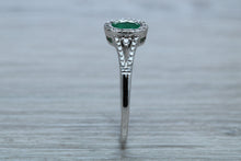 Load image into Gallery viewer, Emerald and Diamond Halo Ring