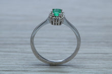 Load image into Gallery viewer, Emerald and Diamond Halo Ring