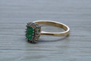 Emerald and Diamond Halo set Ring
