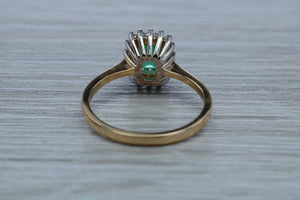 Emerald and Diamond Halo set Ring