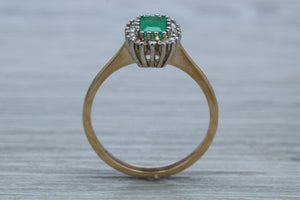 Emerald and Diamond Halo set Ring