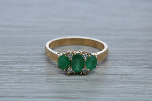 Two carats Three Emeralds and Diamond set Ring