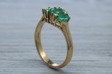 Load image into Gallery viewer, Two carats Three Emeralds and Diamond set Ring