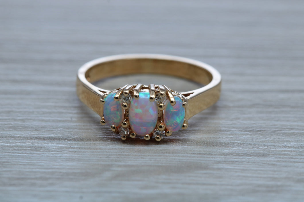 Fiery Opal and Diamonds set Yellow Gold Ring