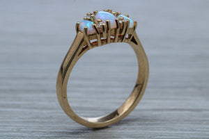 Fiery Opal and Diamonds set Yellow Gold Ring