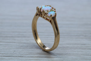 Fiery Opal and Diamonds set Yellow Gold Ring