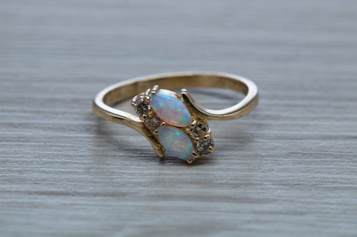 Fiery Opal and Diamonds set Yellow Gold Ring