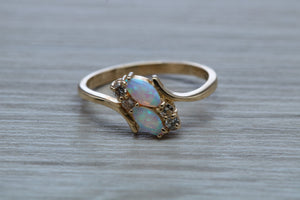 Fiery Opal and Diamonds set Yellow Gold Ring
