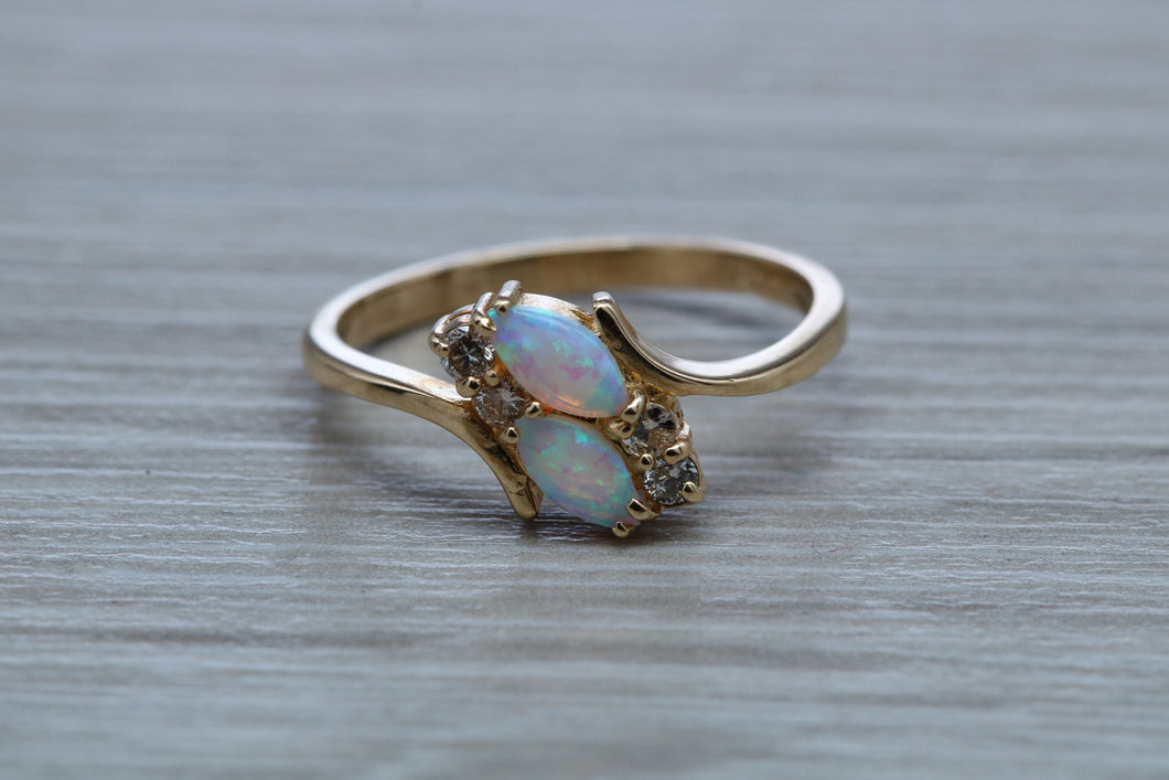 Fiery Opal and Diamonds set Yellow Gold Ring