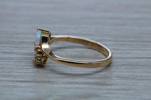 Fiery Opal and Diamonds set Yellow Gold Ring
