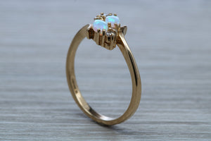 Fiery Opal and Diamonds set Yellow Gold Ring