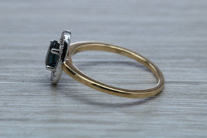 Beautiful Halo set Blue Sapphire and Diamond Ring