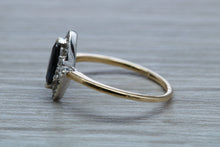 Load image into Gallery viewer, Marquise cut Halo set Blue Sapphire and Diamond Ring
