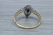 Load image into Gallery viewer, Marquise cut Halo set Blue Sapphire and Diamond Ring
