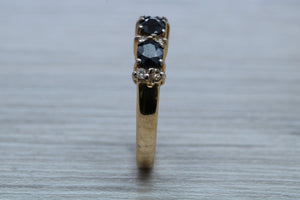 Blue Sapphire and Diamond Eternity Ring
