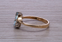 Load image into Gallery viewer, Sky Blue Topaz and Diamond set Yellow Gold Ring