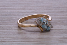 Load image into Gallery viewer, Sky Blue Topaz and Diamond set Yellow Gold Ring