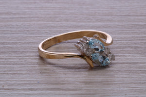 Sky Blue Topaz and Diamond set Yellow Gold Ring
