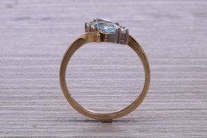 Sky Blue Topaz and Diamond set Yellow Gold Ring