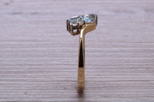 Sky Blue Topaz and Diamond set Yellow Gold Ring