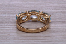 Load image into Gallery viewer, Sky Blue Topaz set Yellow Gold Twist Shank Ring