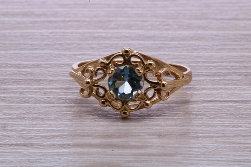 Swiss Blue Topaz set Yellow Gold Ring