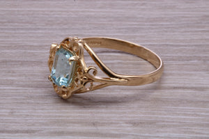 Swiss Blue Topaz set Yellow Gold Ring
