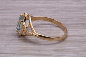 Swiss Blue Topaz set Yellow Gold Ring