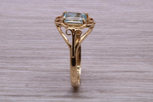 Load image into Gallery viewer, Swiss Blue Topaz set Yellow Gold Ring
