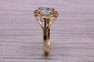 Swiss Blue Topaz set Yellow Gold Ring