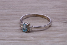 Load image into Gallery viewer, Petite Blue topaz and Diamond set White Gold Trilogy Ring