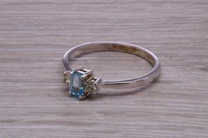 Petite Blue topaz and Diamond set White Gold Trilogy Ring
