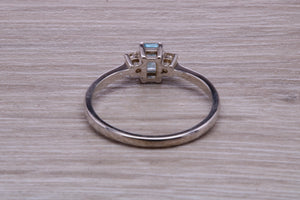 Petite Blue topaz and Diamond set White Gold Trilogy Ring