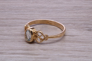 Swiss Blue Topaz set Yellow Gold Ring