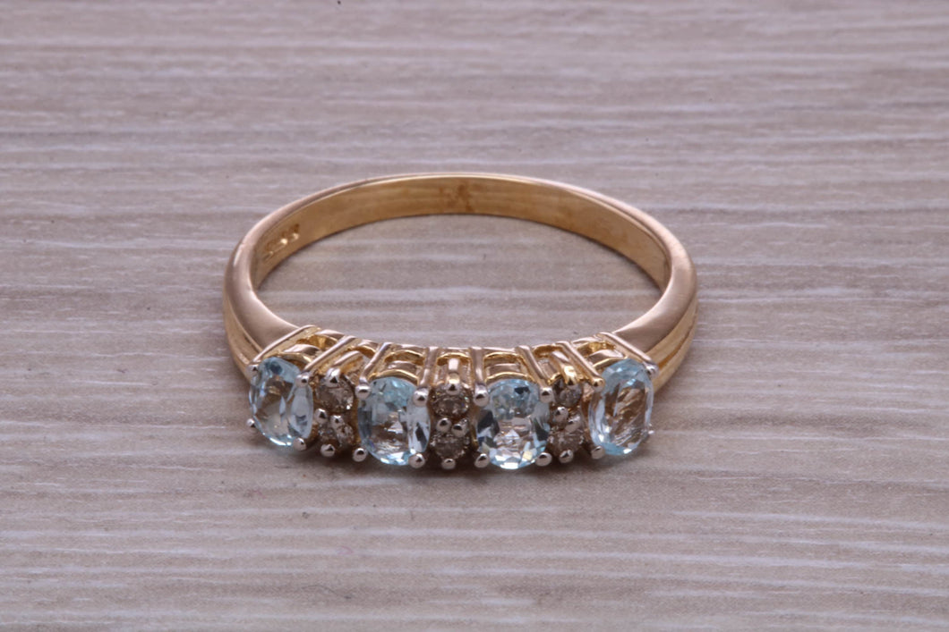 Sky Blue Topaz and Diamond set Yellow Gold Ring