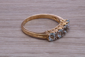 Sky Blue Topaz and Diamond set Yellow Gold Ring
