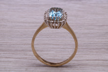 Load image into Gallery viewer, One carat Blue Topaz and Diamond set Yellow Gold Cluster Ring
