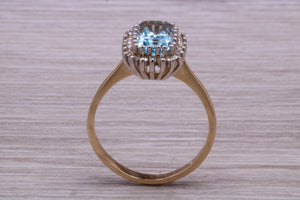 One carat Blue Topaz and Diamond set Yellow Gold Cluster Ring