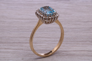 One carat Blue Topaz and Diamond set Yellow Gold Cluster Ring