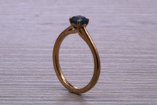Load image into Gallery viewer, Dainty London Blue Topaz set Yellow Gold Ring