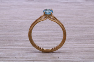 Dainty Sky Blue Topaz set Yellow Gold Ring