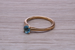 Dainty Sky Blue Topaz set Yellow Gold Ring