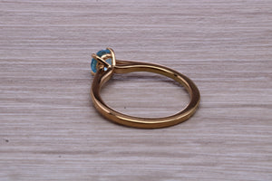 Dainty Sky Blue Topaz set Yellow Gold Ring