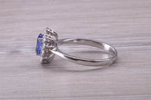 Load image into Gallery viewer, One and Half carat AAA Grade Tanzanite and Diamond Halo Ring