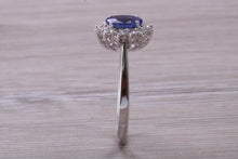Load image into Gallery viewer, One and Half carat AAA Grade Tanzanite and Diamond Halo Ring