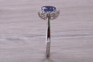 One and Half carat AAA Grade Tanzanite and Diamond Halo Ring