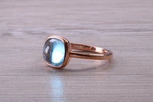 Cabochon cut Blue Topaz set Rose Gold Ring