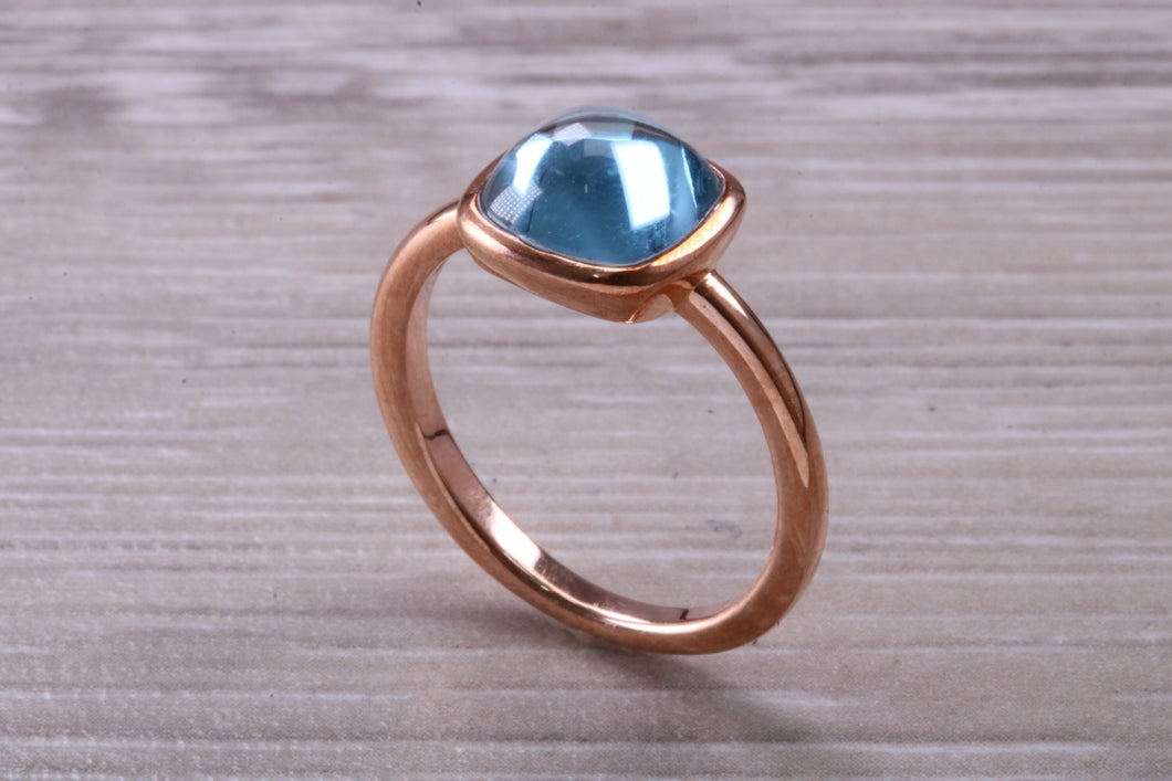 Cabochon cut Blue Topaz set Rose Gold Ring
