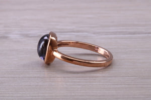 Cabochon cut Iolite set Rose Gold Ring